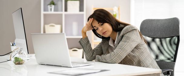 Stressed Sick Employee Woman Using Computer In Office - Фото, зображення
