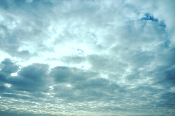 blue cloudy sky on a sunny day background screensaver backdrop - Photo, Image