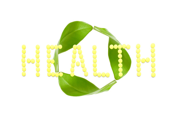 Word HEALTH made from yellow medication pills isolated on white - Φωτογραφία, εικόνα