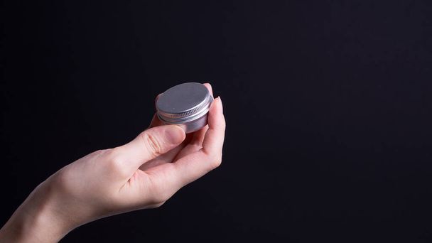 packaging of hand cream in female hands - Photo, Image
