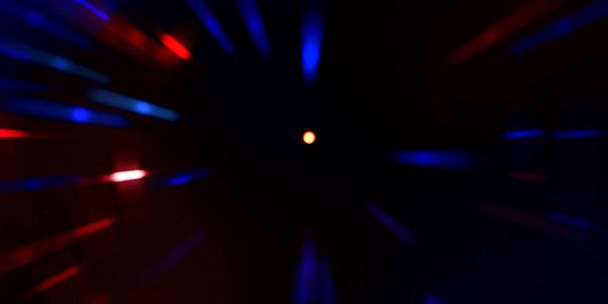 Fondo fresco de luces brillantes en movimiento. Plantilla de portal vibrante y colorido para su diseño. Rayos de luz y partículas de brillo en movimiento formando una forma de agujero de gusano
. - Foto, Imagen