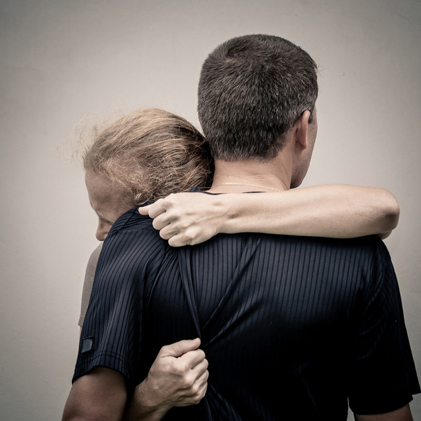 Sad woman hugging her husband - Fotografie, Obrázek