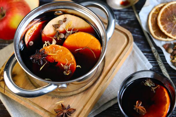 Mulled wine with citruses and red wine. - Photo, Image