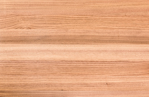 фон и текстура декоративной поверхности мебели из орехового дерева - Фото, изображение