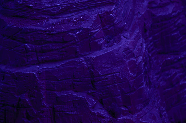 Dark mountain texture in purple color background - Photo, image