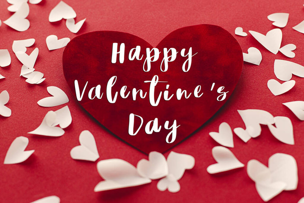 Happy Valentines Day greeting card. Happy Valentine's Day text on stylish hearts on red background. Be my Valentine. Love concept - Foto, imagen