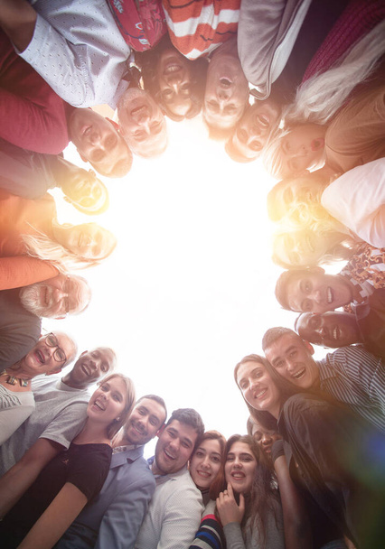 Group of happy international people standing in circle - Foto, imagen