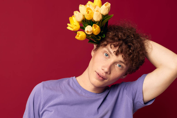 young guy red hair in casual wear bouquet of flowers gift isolated background unaltered - Fotografie, Obrázek