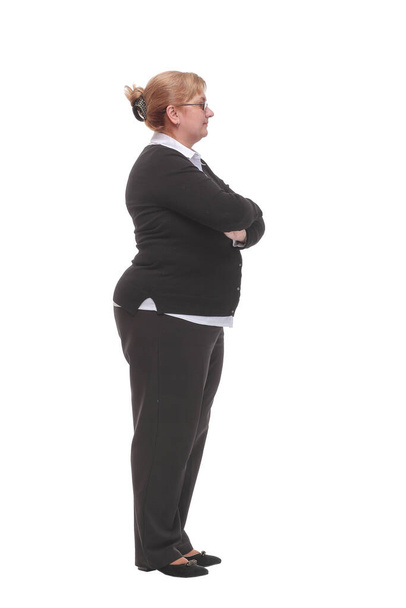 Side view happy businesswoman wearing black suit standing with crossed arms - Fotó, kép