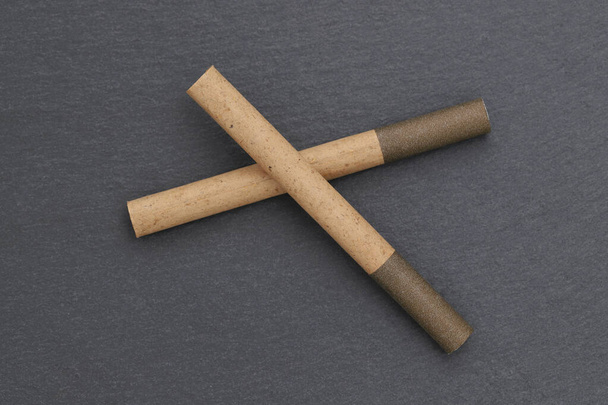 cigarette on dark grey background - Zdjęcie, obraz