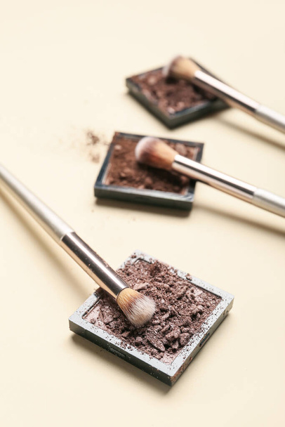 Makeup brush and eye shadow palette on light background - Photo, Image