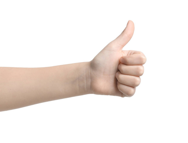 Child showing thumb-up on white background - Foto, Imagen