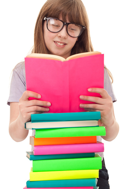 Girl with books reading - Фото, изображение