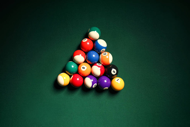 Different billiard balls on table - Fotografie, Obrázek