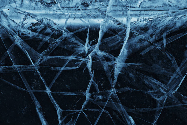 ice texture cracks baikal, abstract background winter ice transparent blue - Foto, imagen