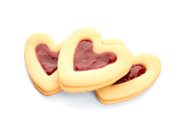 Tasty cookies in heart shape on white background - Valokuva, kuva