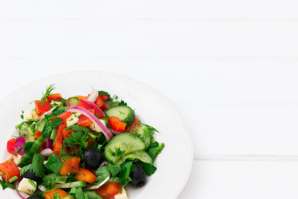 Useful vegetables healthy salad on white plate. - Foto, Bild
