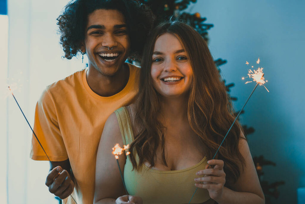 modern multiethnic unstereotyped couple celebrating holidays. Not stereotyped boyfriend and girlfriend together. True love romantic concepts - Foto, Imagen