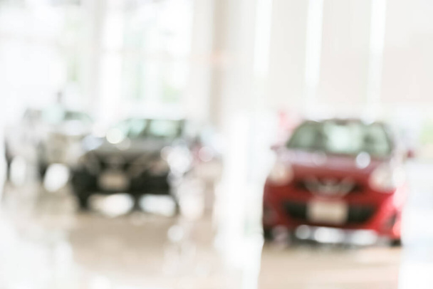 Abstract blur of car in the showroom background - Photo, Image