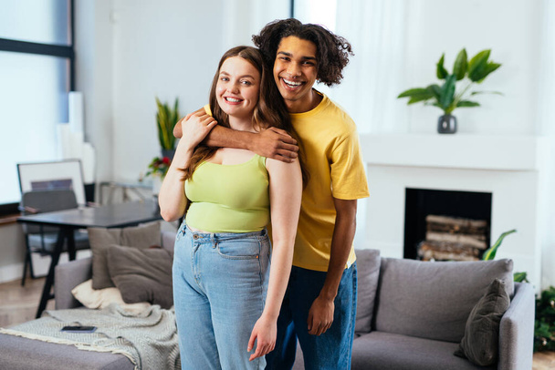 modern multiethnic unstereotyped couple lifestyle moments at home. Not stereotyped boyfriend and girlfriend living together. True love concepts - Foto, immagini