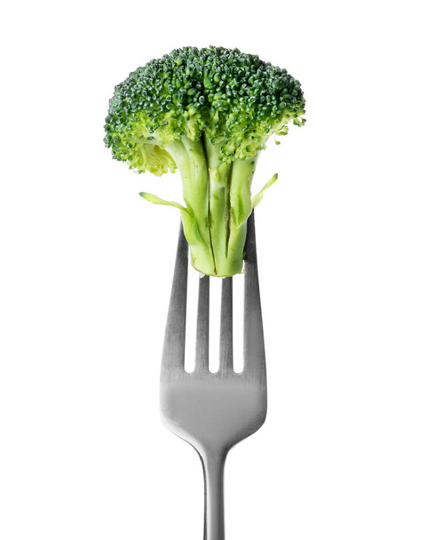 Fork with fresh broccoli isolated on white background - Foto, imagen