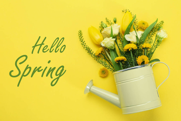 Concept of "Hello Spring" on yellow background - Фото, изображение