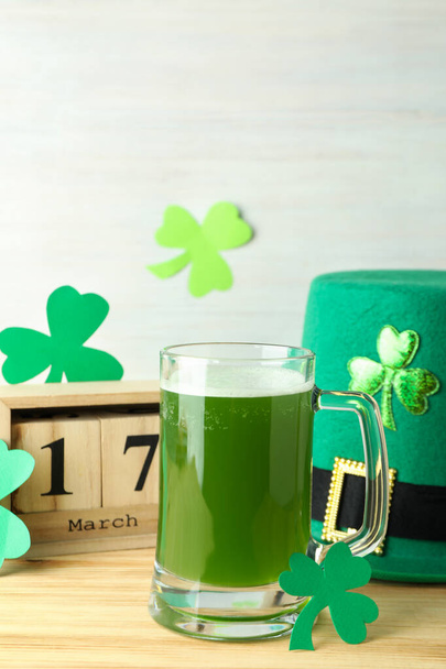 Different St.Patrick's Day accessories on wooden table - Foto, immagini