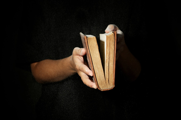 Woman holding very old book - Фото, изображение