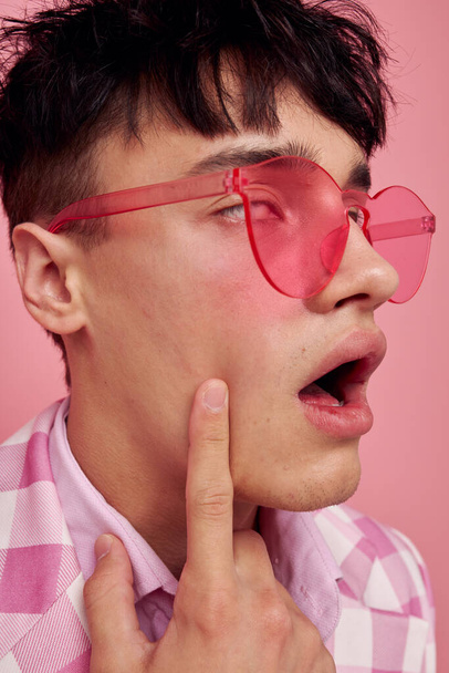 portrait of a young man pink plaid blazer fashion modern style isolated background unaltered - Φωτογραφία, εικόνα