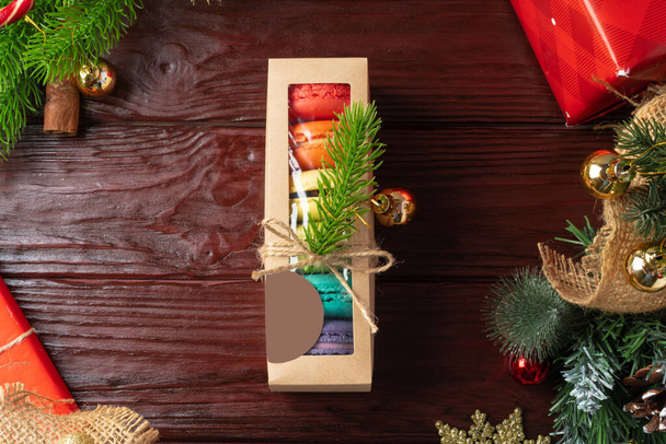 Beautiful colorful set of macarons on Christmas background - Фото, зображення