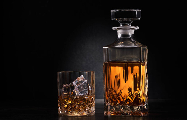 Closeup of scotch whiskey or rum with ice cubes - Zdjęcie, obraz