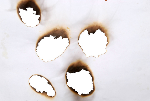 Burnt holes - Foto, Bild