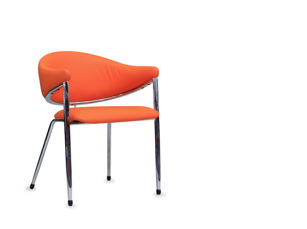The office chair from orange leather. Isolated - Fotó, kép