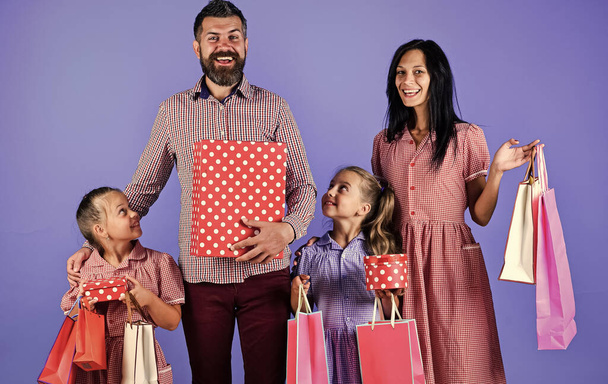 happy family go shopping together hold packages, shop - Foto, Bild