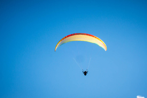 paragliding flight in the mountains. Le Grand-Bornand, Haute-Savoie, France - Fotoğraf, Görsel