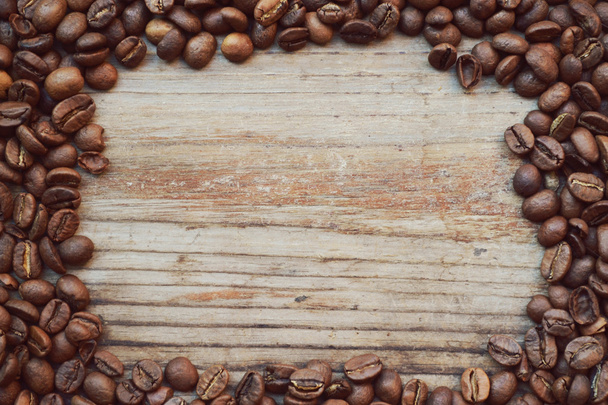 Рамка з багатьох смажених кавових зерен
 - Фото, зображення