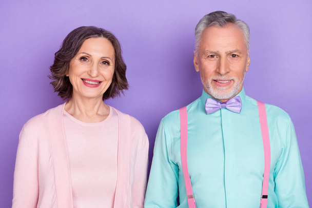 Portrait of cheerful friendly people toothy beaming smile look camera isolated on purple color background - Fotografie, Obrázek