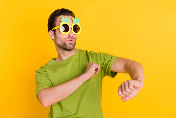 Photo of young excited man have fun dance eyewear club journey isolated over yellow color background - Foto, afbeelding