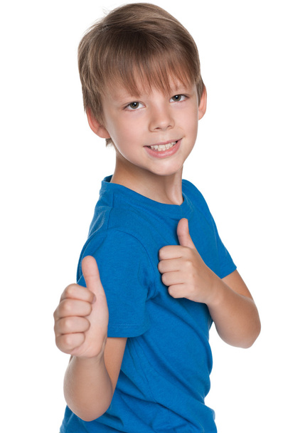 Little boy with his thumbs up - Фото, зображення
