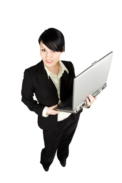 Businesswoman and laptop - Foto, Bild