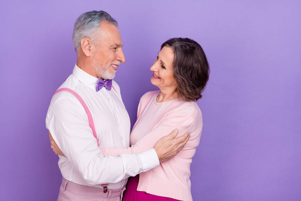 Profile portrait of two lovely soulmates hug dance affectionate isolated on purple color background - Fotoğraf, Görsel