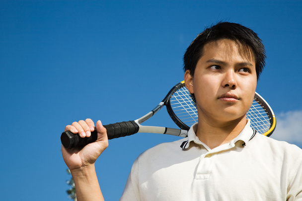 asijské muž hraje tenis - Fotografie, Obrázek