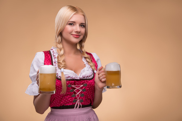 Young sexy blonde wearing dirndl - Foto, afbeelding