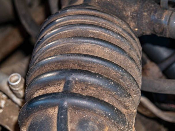 Rubber pipe of the exhaust system of a car engine. - Photo, Image