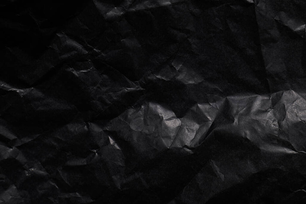 black crumpled paper texture with copy space - Φωτογραφία, εικόνα