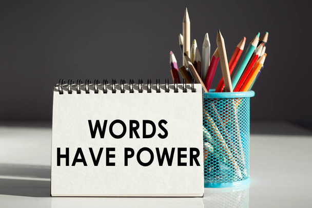 WORDS HAVE POWER - inscription on a notebook with colored pencils. - Fotografie, Obrázek