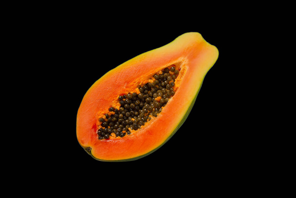Papaya fruit isolated on a white background. Tropical fruit. Half papaya. Top view.  - Foto, Bild