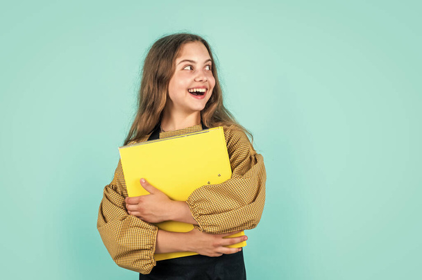 future business success. study and work. happy teen girl with document folder. - Фото, зображення