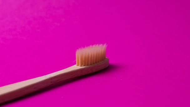 Bamboo toothbrush, top view, isolated - Zdjęcie, obraz