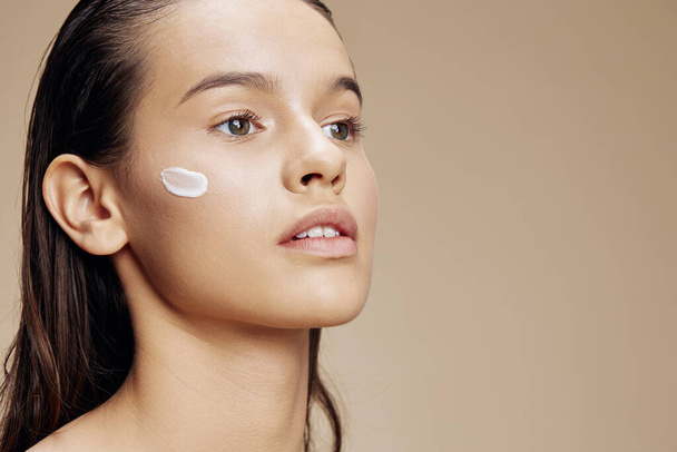 woman face mask cream clean skin facial scrub isolated background - Фото, зображення